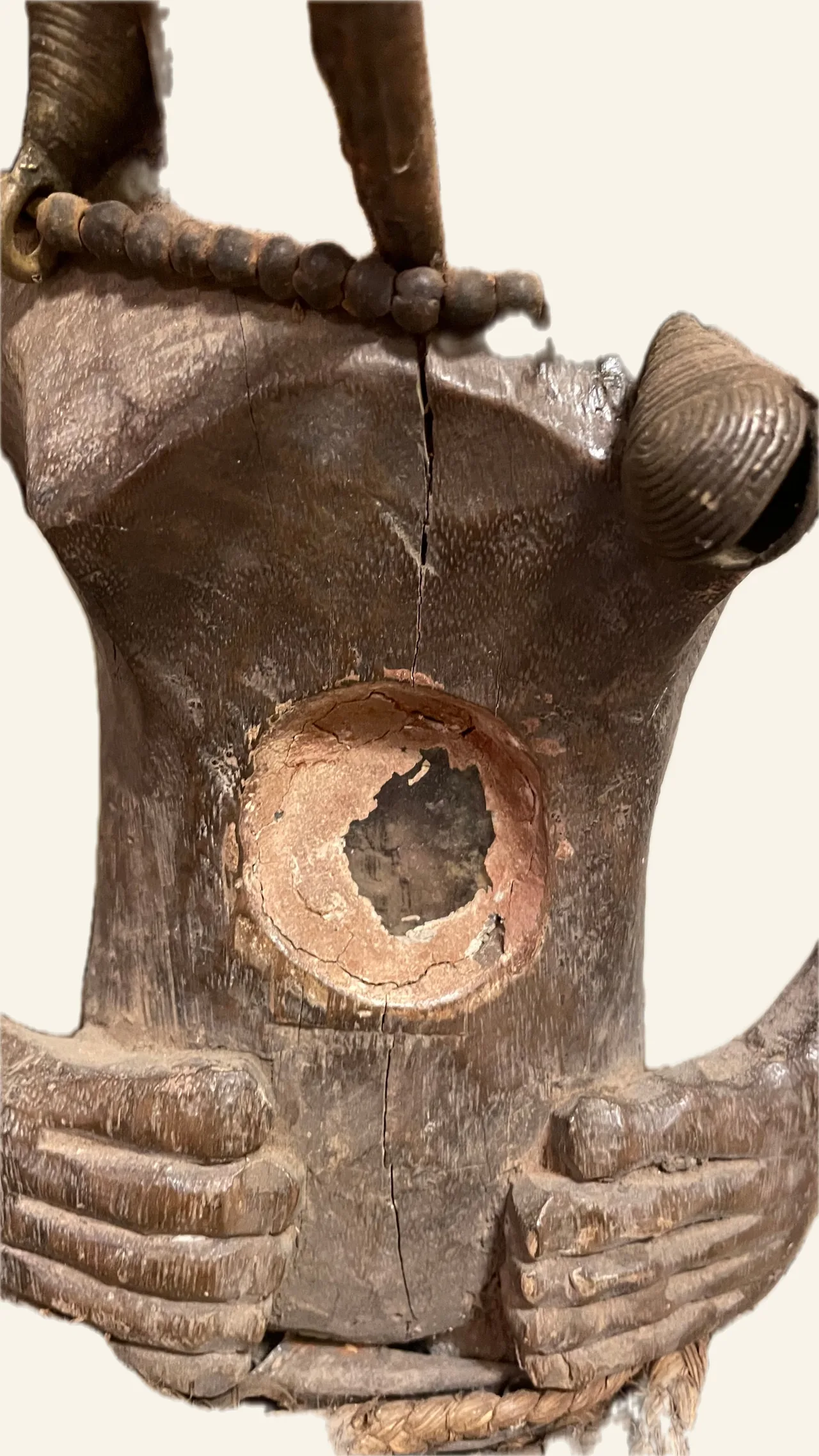 Nkisi Figure, Kongo (Yombe Style), detail of the belly cavity and hands