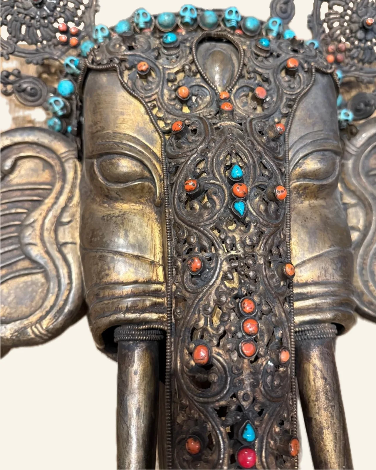 Gilt copper mask of Ganesha, detail of the face and trunk