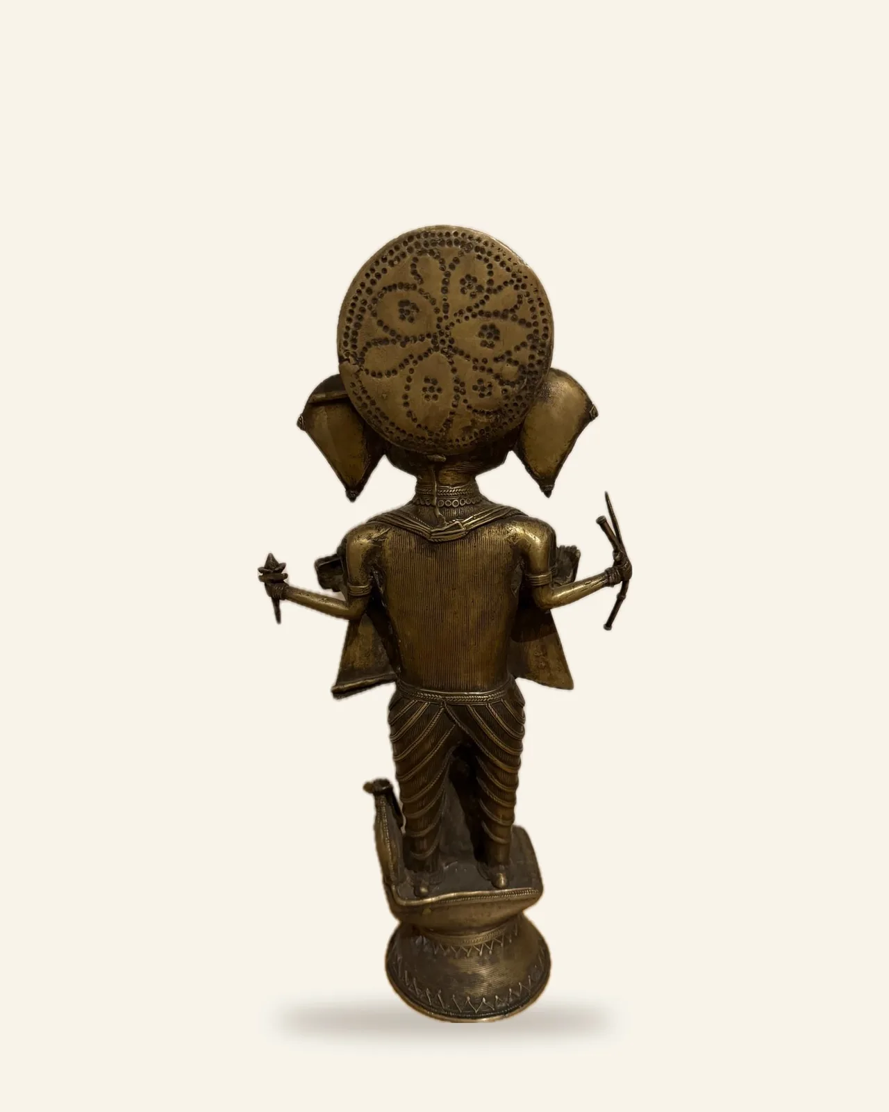 Standing Ganesha from the back, with the punched halo