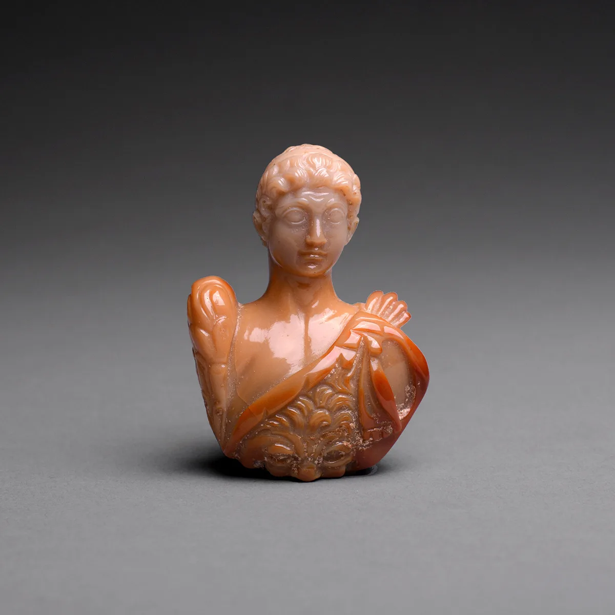 Roman Carnelian or Agate Sculpture of an Emperor Wearing A Lion Skin, view 1