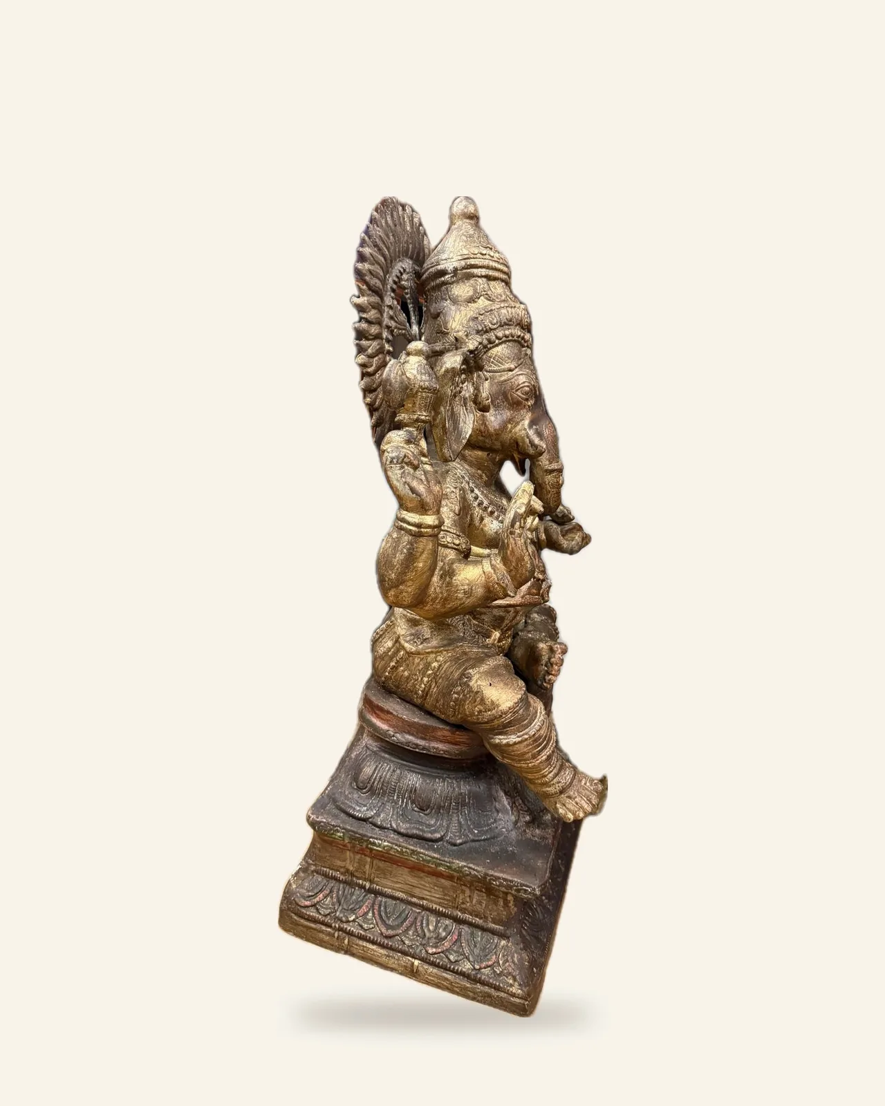 Seated Ganesha with flaming aureole, side view