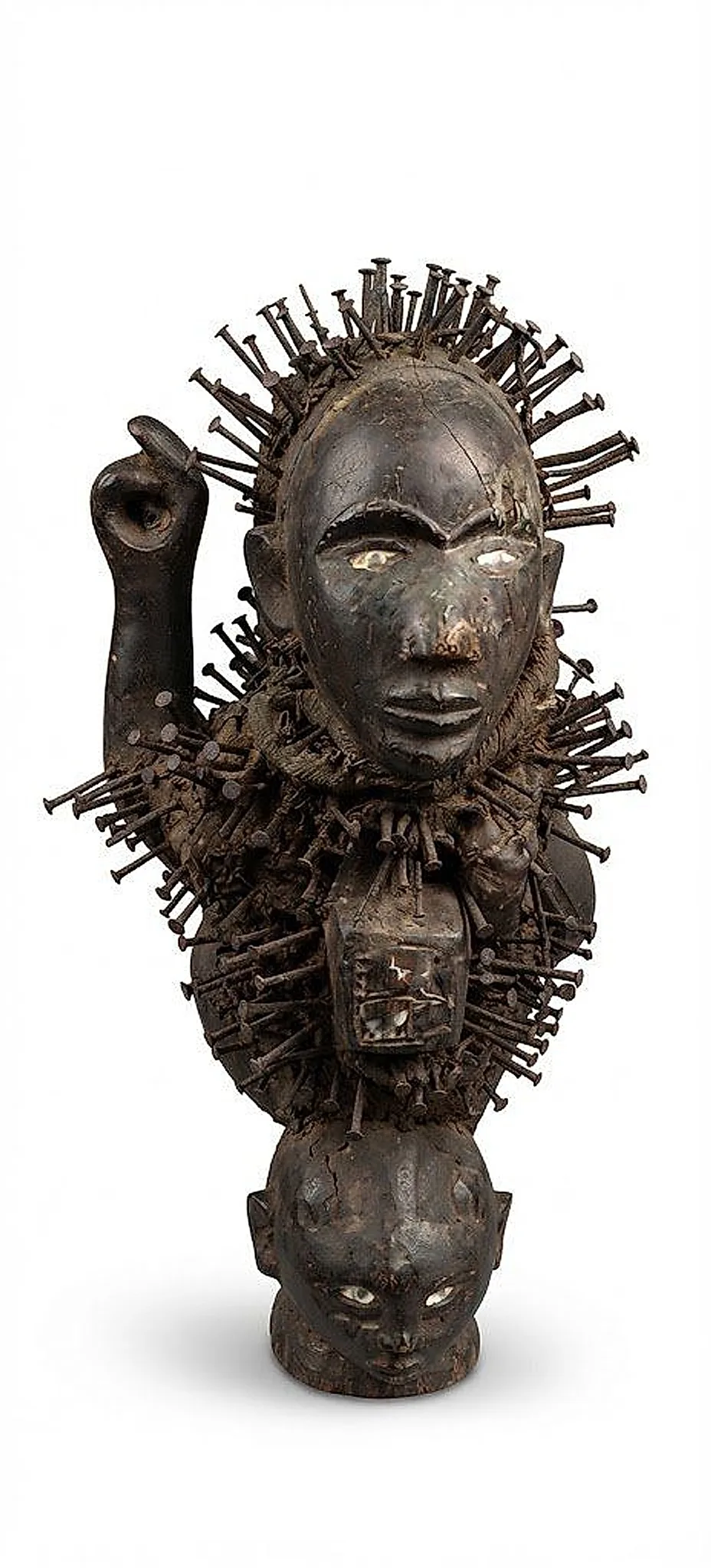 Bust with Raised Fist and Nail Halo, on a Carved Head (Nkisi Nkondi)