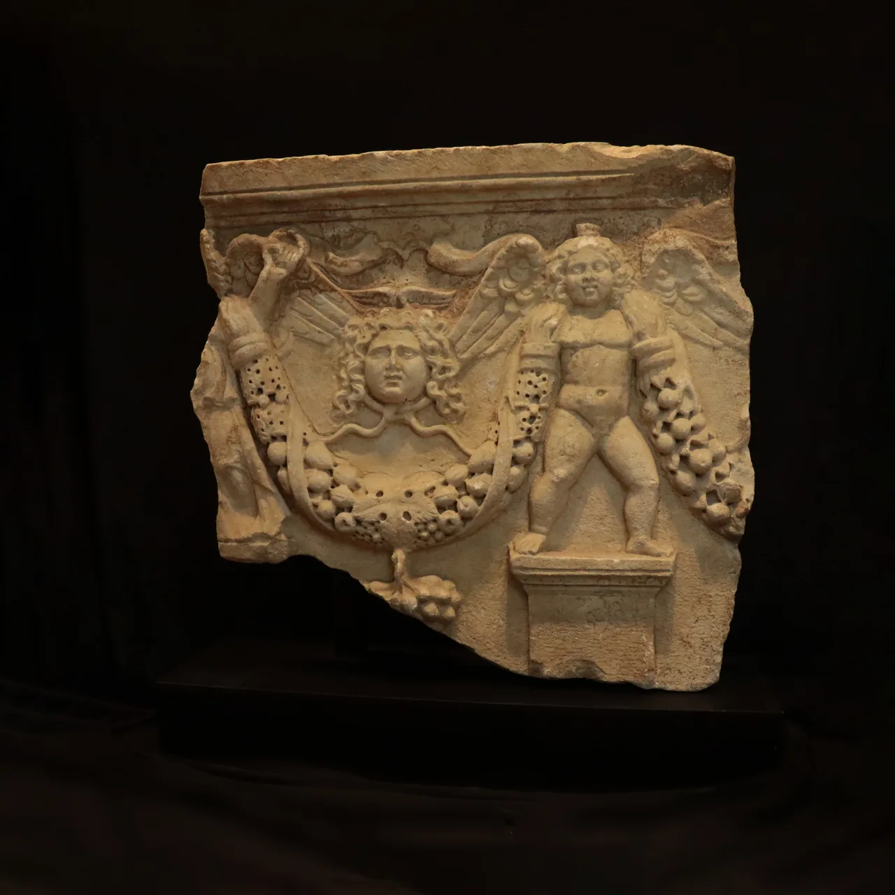 Roman Marble Fragment of a Garland Sarcophagus, view 1