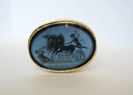 Gold Ring Featuring a Roman Sardonyx Seal Depicting a Quadriga