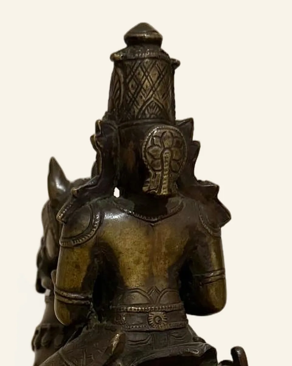Khandoba on horseback, detail: rider from behind