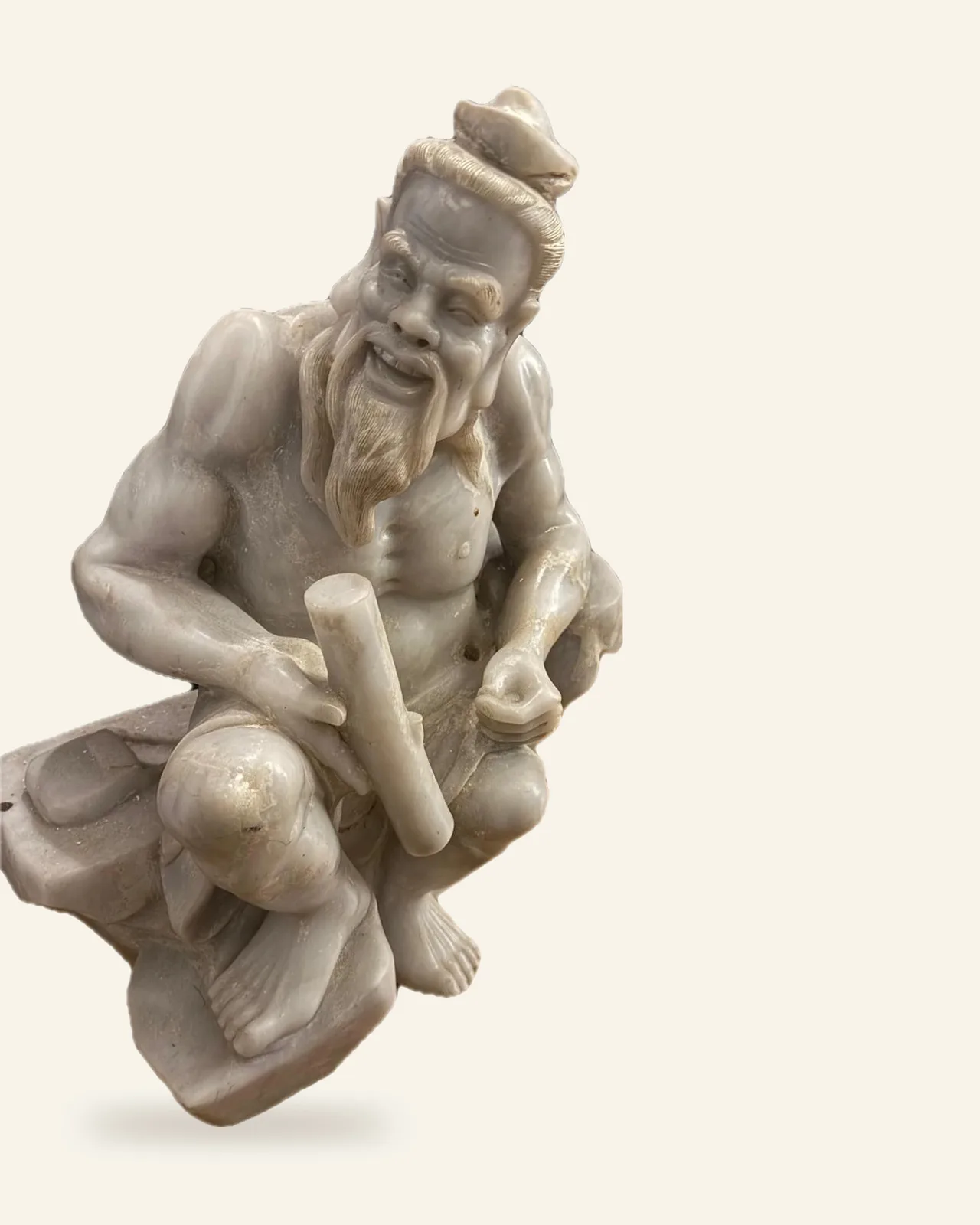 Chinese Carved Lavender Jade Figure of a Seated Immortal, front view