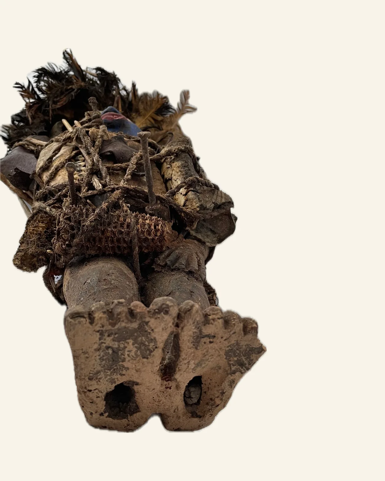 Pair of Nkisi, Kongo, second figure, underside of the feet