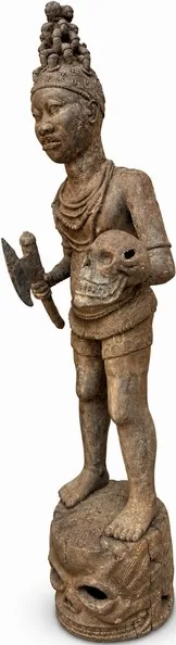 Standing Warrior with Axe and Trophy Skull, West African Court Style, three-quarter view